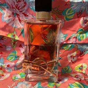 Yves Saint Laurent Floral Perfume with Gold Accent